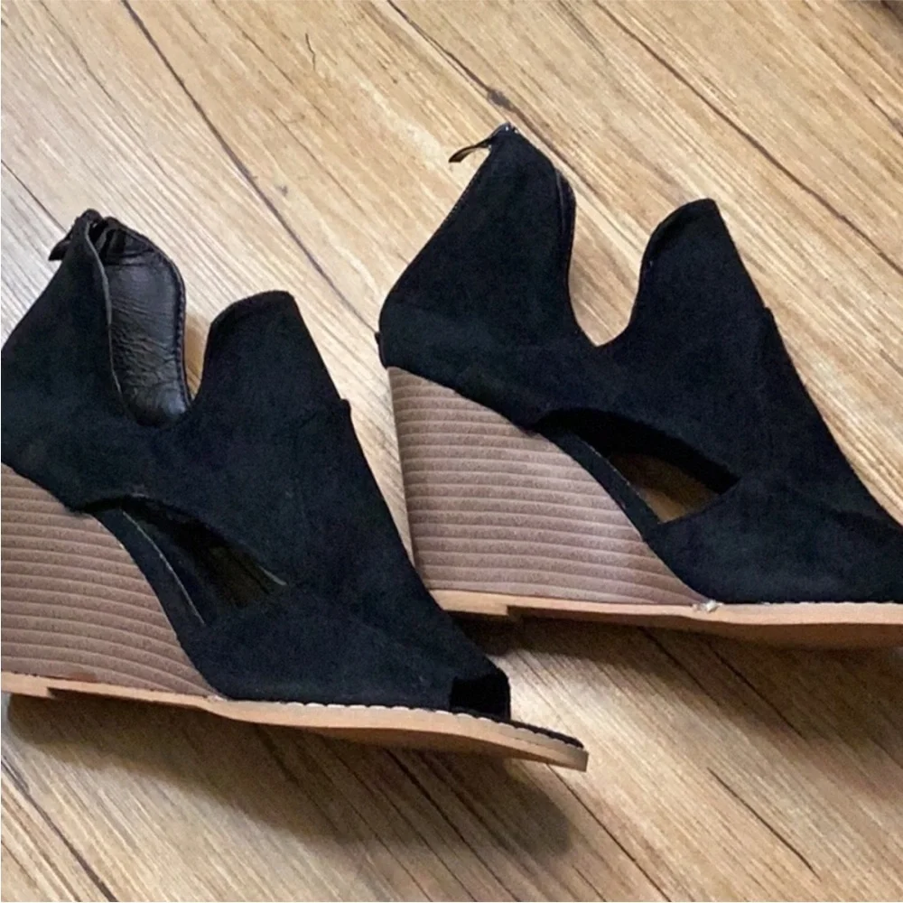 Black cut out suede wedge heels